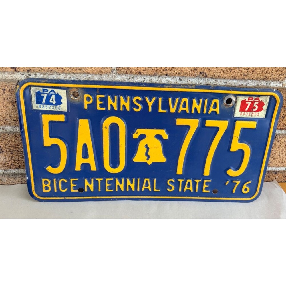 1974/75 Pennsylvania Bicentennial License Plate PA Penna Ford Chevrolet 5A0775